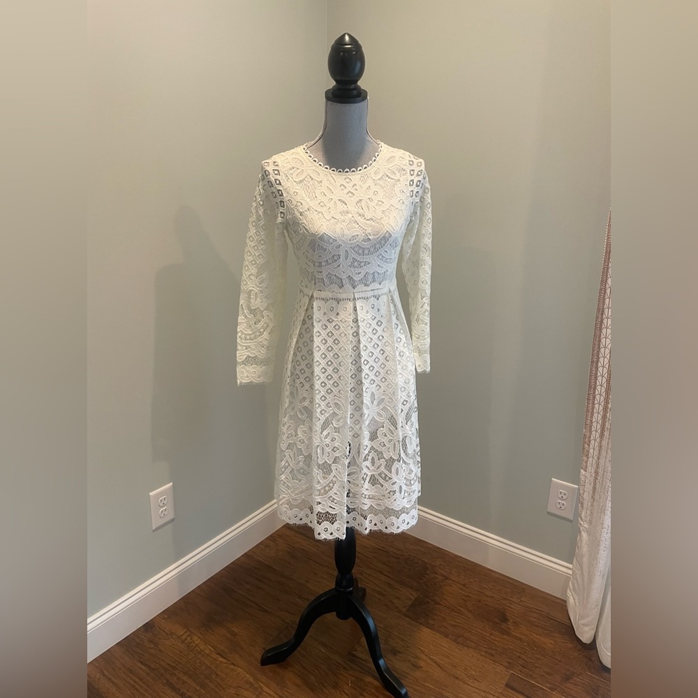 Cream lace dress, long sleeves, knee length. Size M